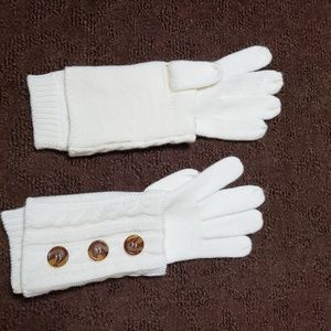 Cute buttoned white gloves.